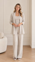 Front view of woman wearing Oatmeal 3-piece knit loungewear set with cardigan, tank, and wide-leg pants
