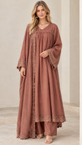 Front full-length view of model wearing dusty rose 3-piece abaya set with lace trim