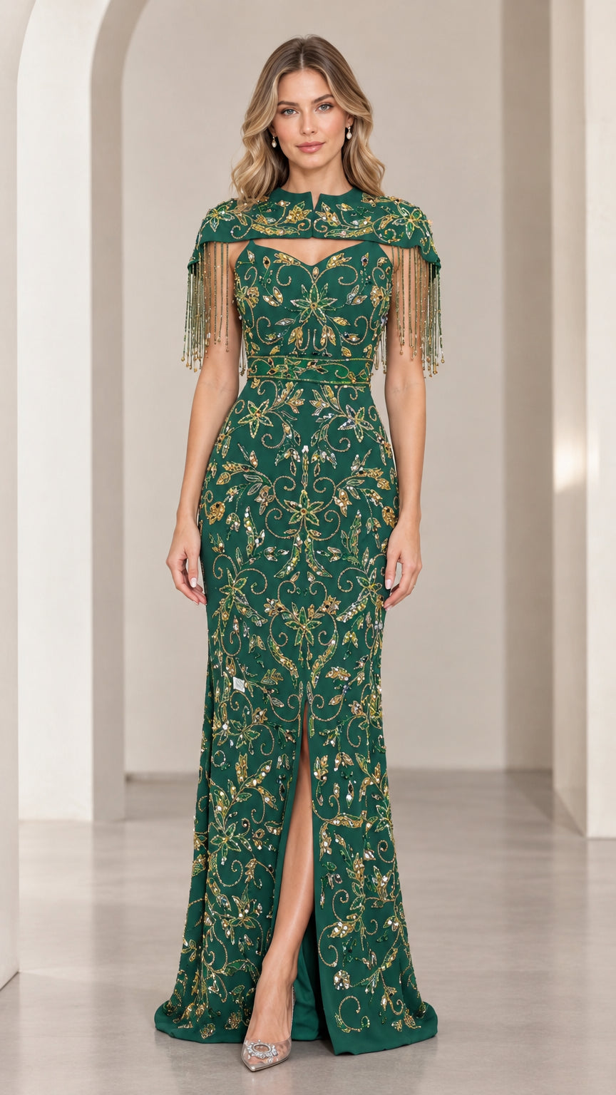 Emerald green sequined evening gown with beaded fringe capelet and front slit front view