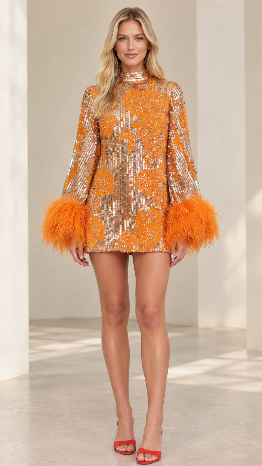 Model wearing orange sequin mock neck mini dress with plush feather cuffs front view
