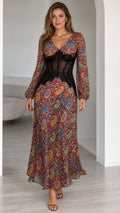 Front view of model wearing Burgundy Multi paisley print maxi dress with black lace corset waist