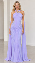 Full front view of model wearing lavender halter neck draped evening gown with corset bodice and shoulder drapes