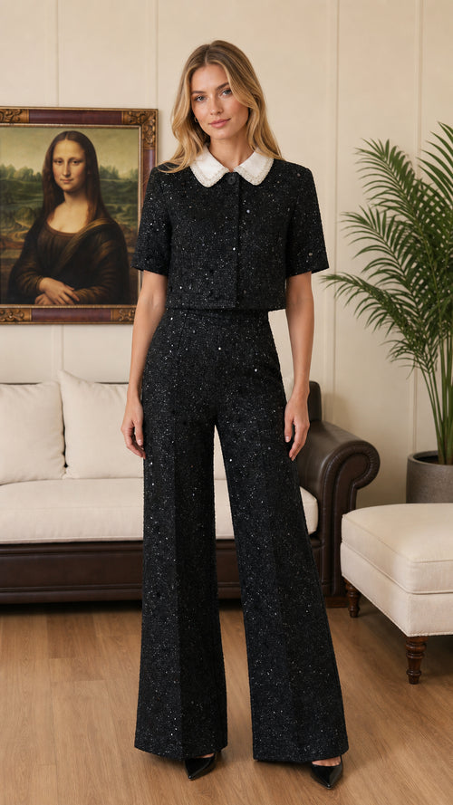 Front full-length view of black tweed two-piece cropped top and wide-leg pants set