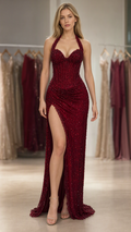Model wearing Burgundy halter sweetheart glitter corset gown front view with high slit