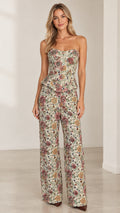 Full front view of model wearing cream floral tapestry strapless peplum top and wide-leg pants set