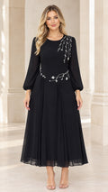 Front view of black long sleeve chiffon midi dress with rhinestone floral embellishments