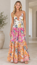 Front full-length view of woman wearing White Multi floral tiered maxi dress with cutout V-neck