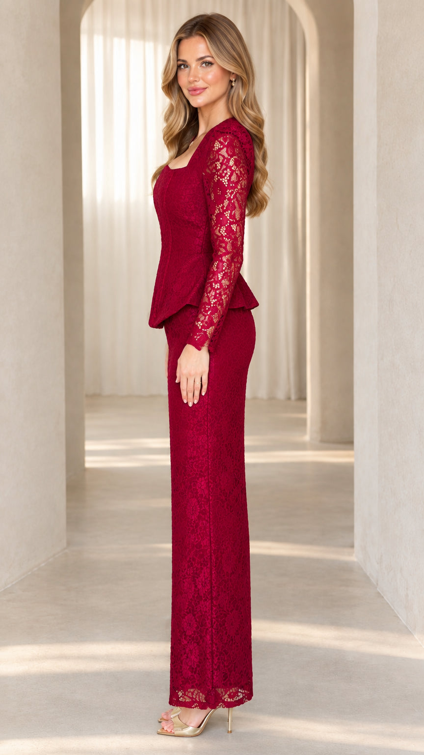 Side profile view of burgundy floral lace long sleeve evening gown