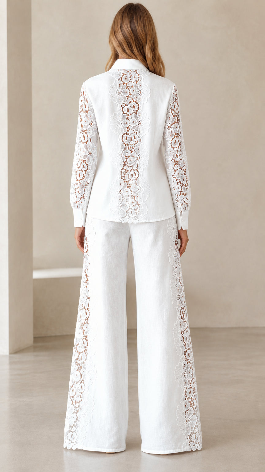 Back view of woman wearing white collared shirt and wide-leg pants with lace back panel