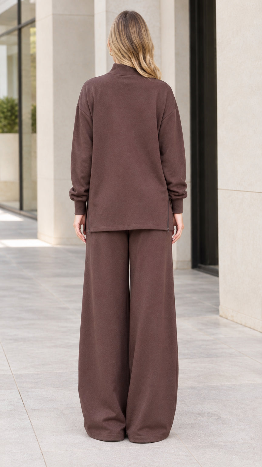 Back view of women's brown fleece tracksuit set with wide leg pants