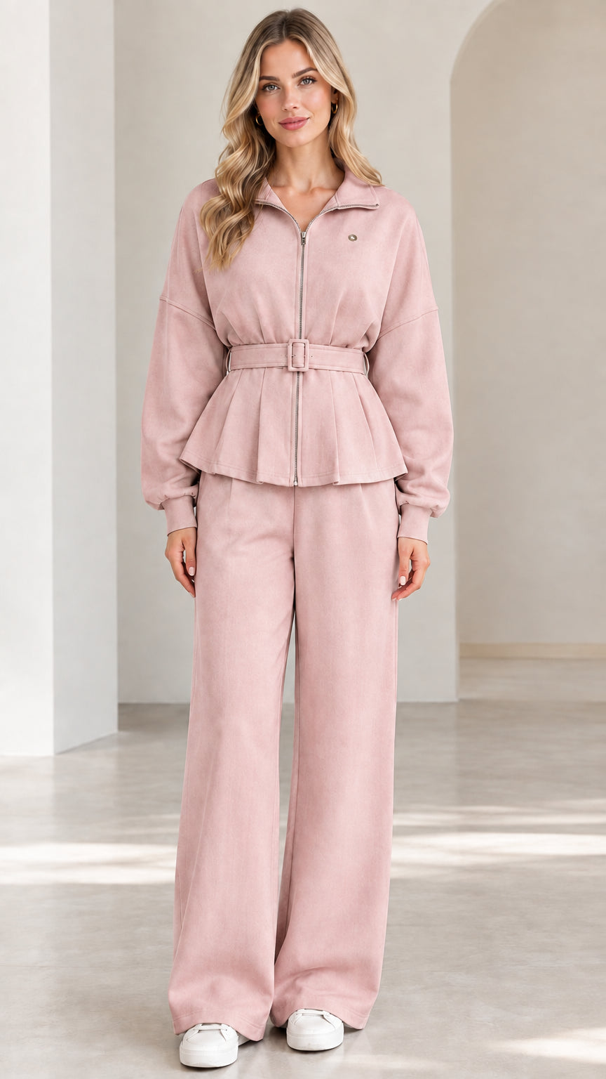Front full-length view of blush pink zip-up belted peplum jacket and wide-leg pants set