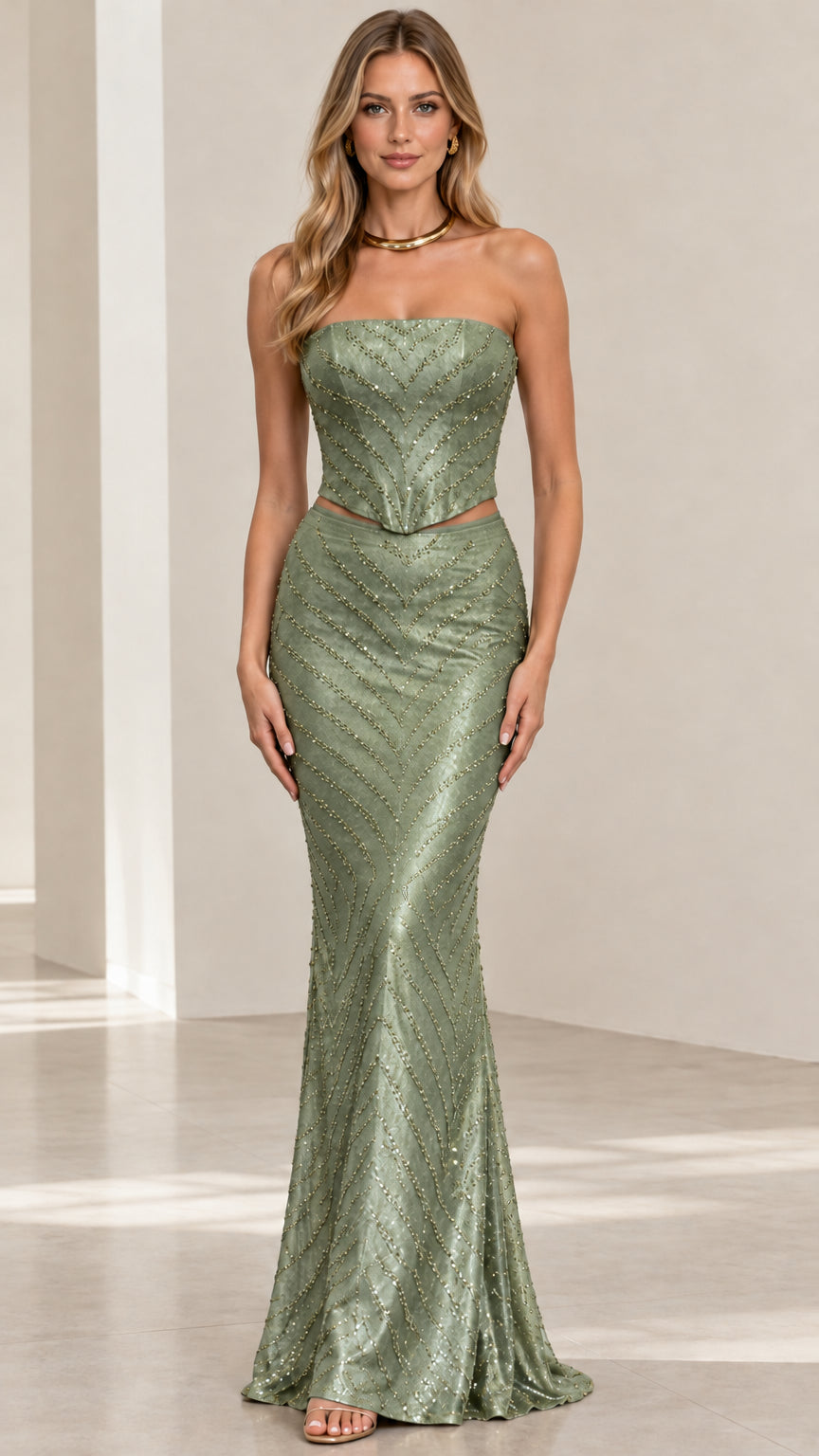 Front view of sage green beaded strapless two-piece evening gown